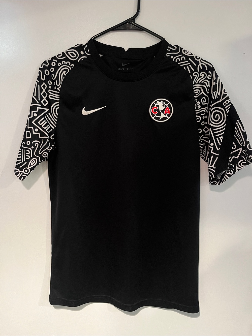 Nike Black Soccer Top with White Graphic Sleeves